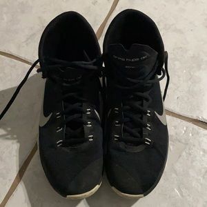 Black/gray/white Nike high top shoes